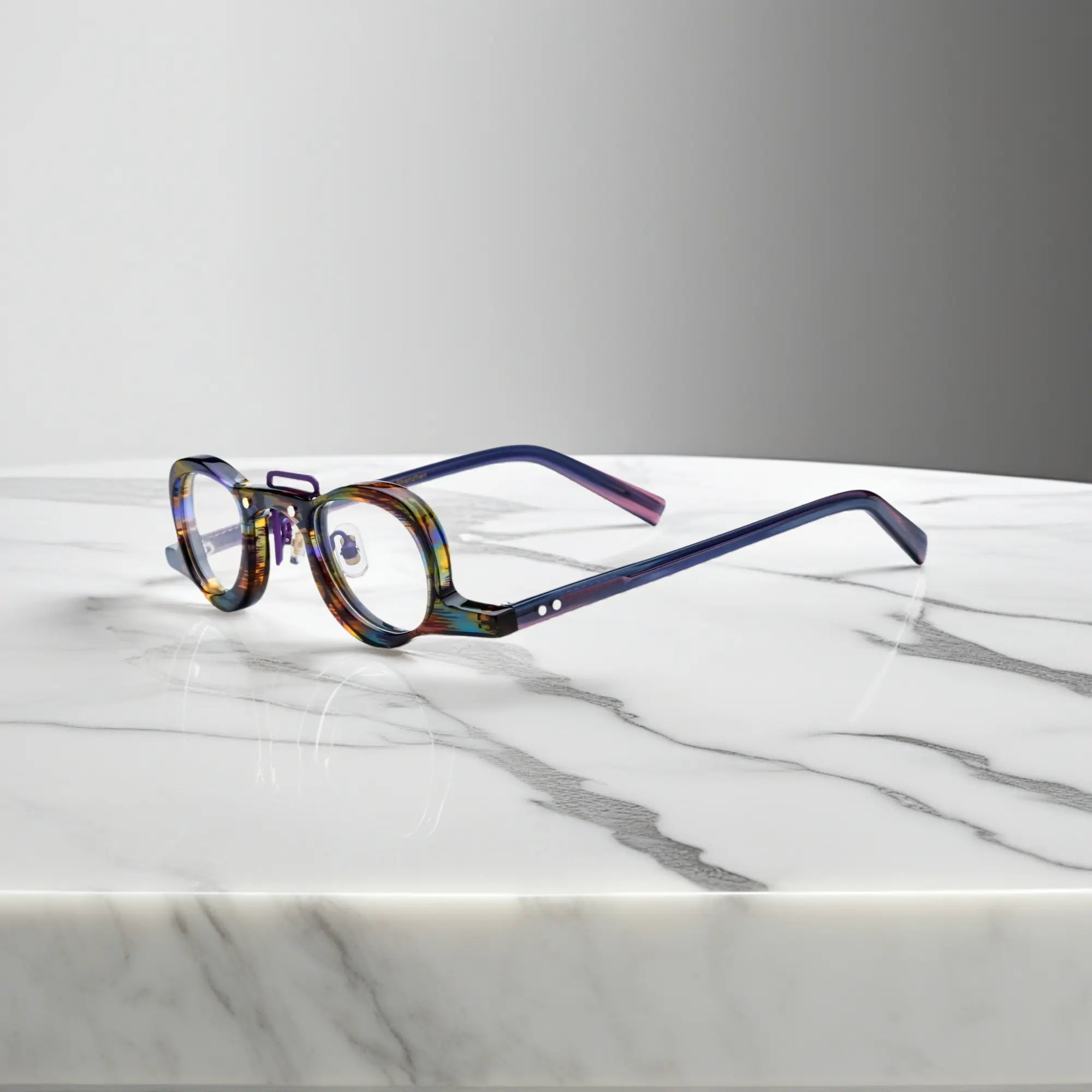 Side profile of VoyueLens™ Rainbow Tortoise geometric eyeglass frames showing temples and nose pads